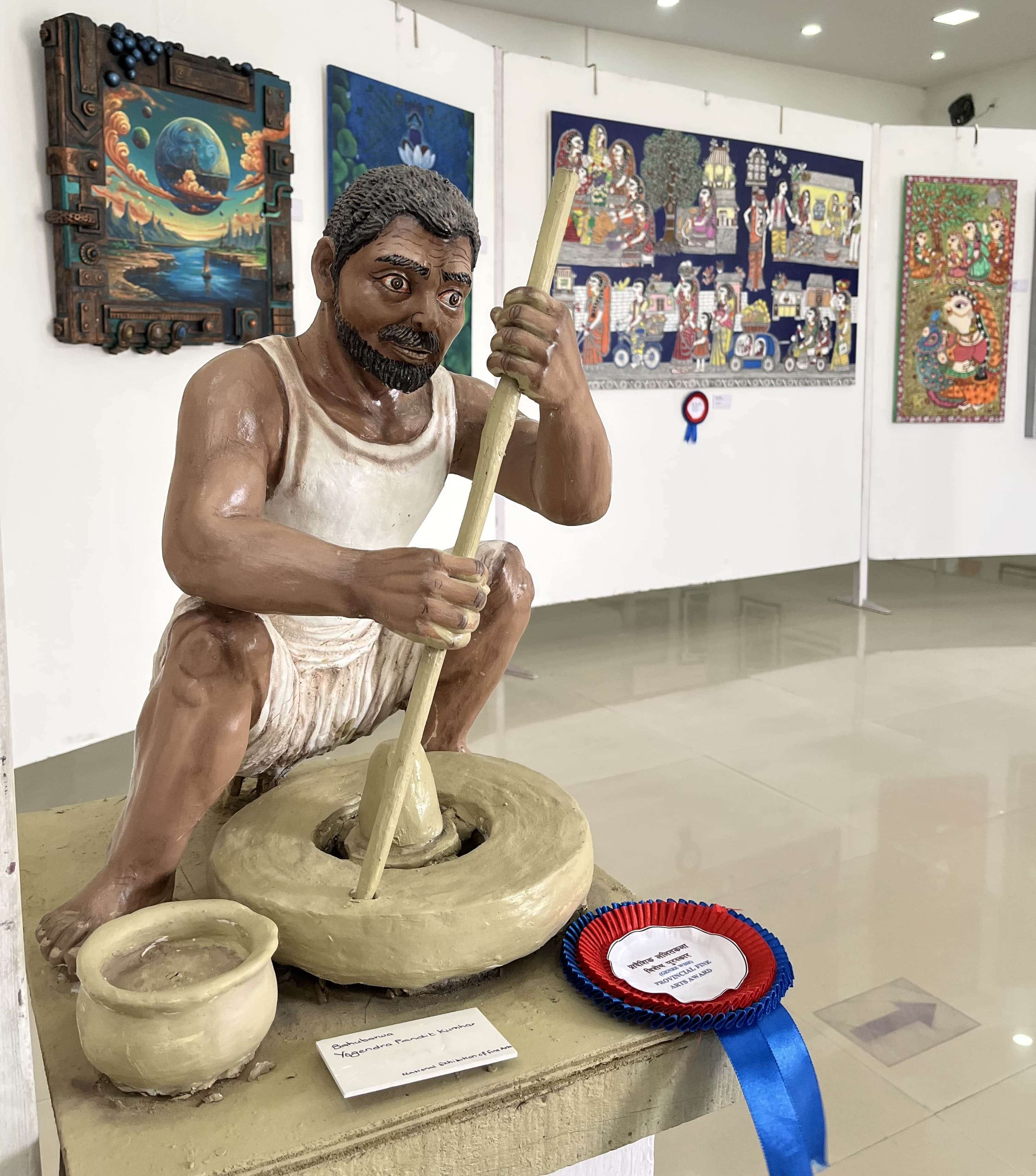 A sculptor’s craft. Bahubarwa or Bahuarwa, meaning ‘many hands’, referring to an artisan’s diverse range of work.