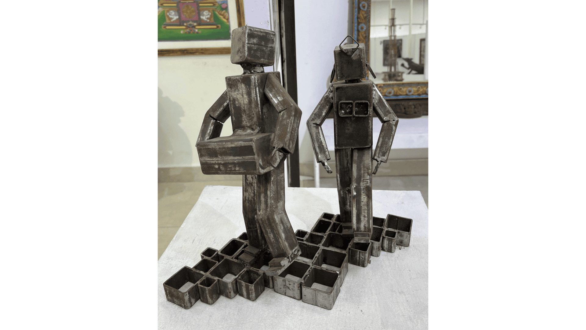 A metal artwork representing Kelang dance—a rhythmic dance form practised by Limbu and Yamphu communities with the beat of Chyabrung, the double-sided drum.