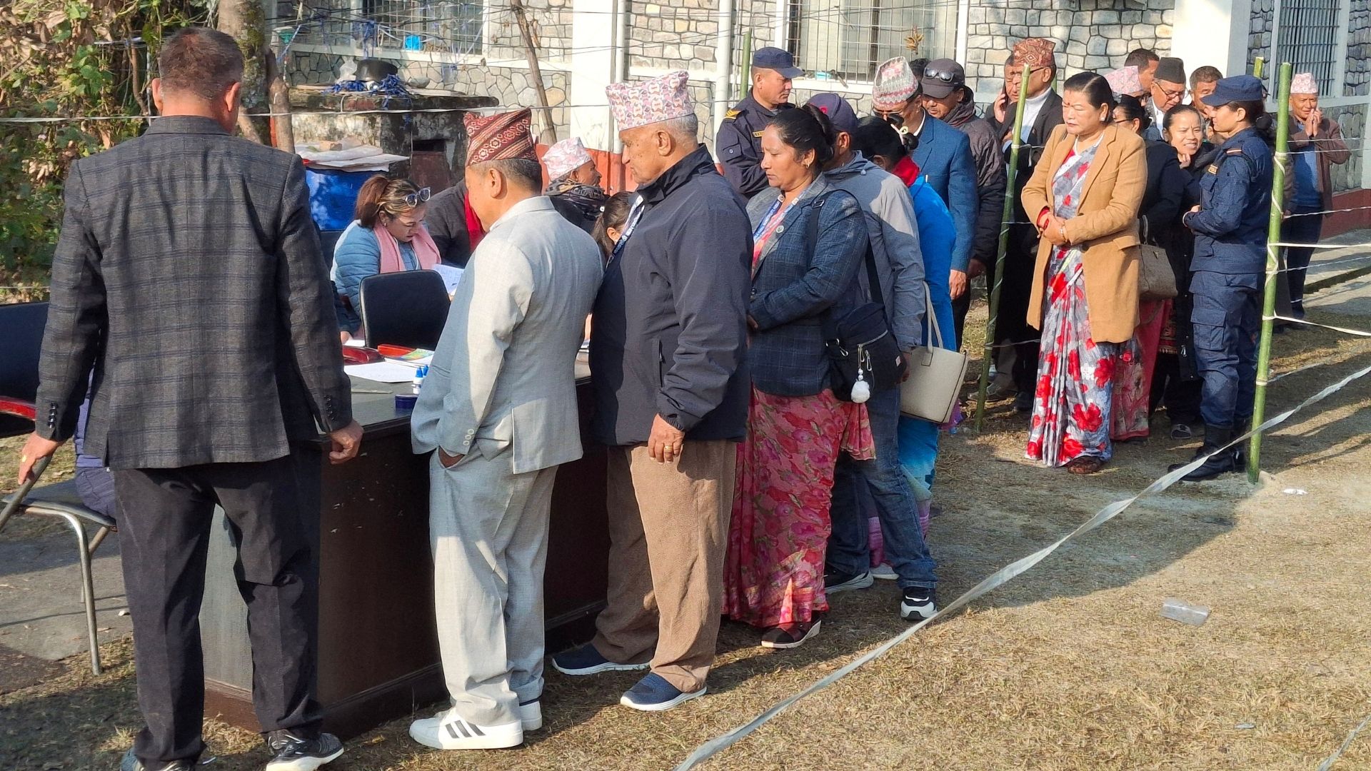 Voters queue up to cast their votes for two seats in Gandaki Province in the National Assembly elections on Sunday | Photo: Krishna Duwadi/RSS