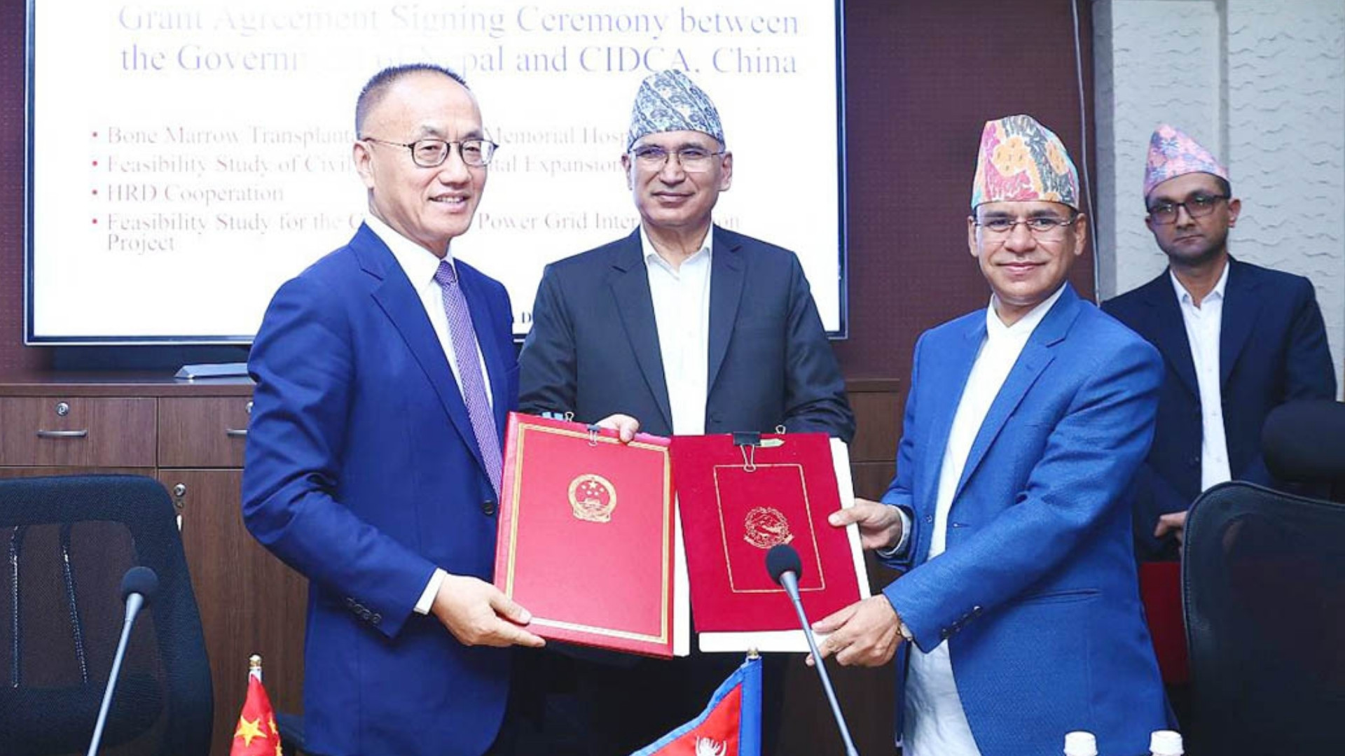 CIDCA Chairman Chen Xiaodong (Left), Finance Minister Bishnu Prasad Paudel (Middle) & Finance Secretary Ghanshyam Upadhyaya (Right) | Photo: RSS
